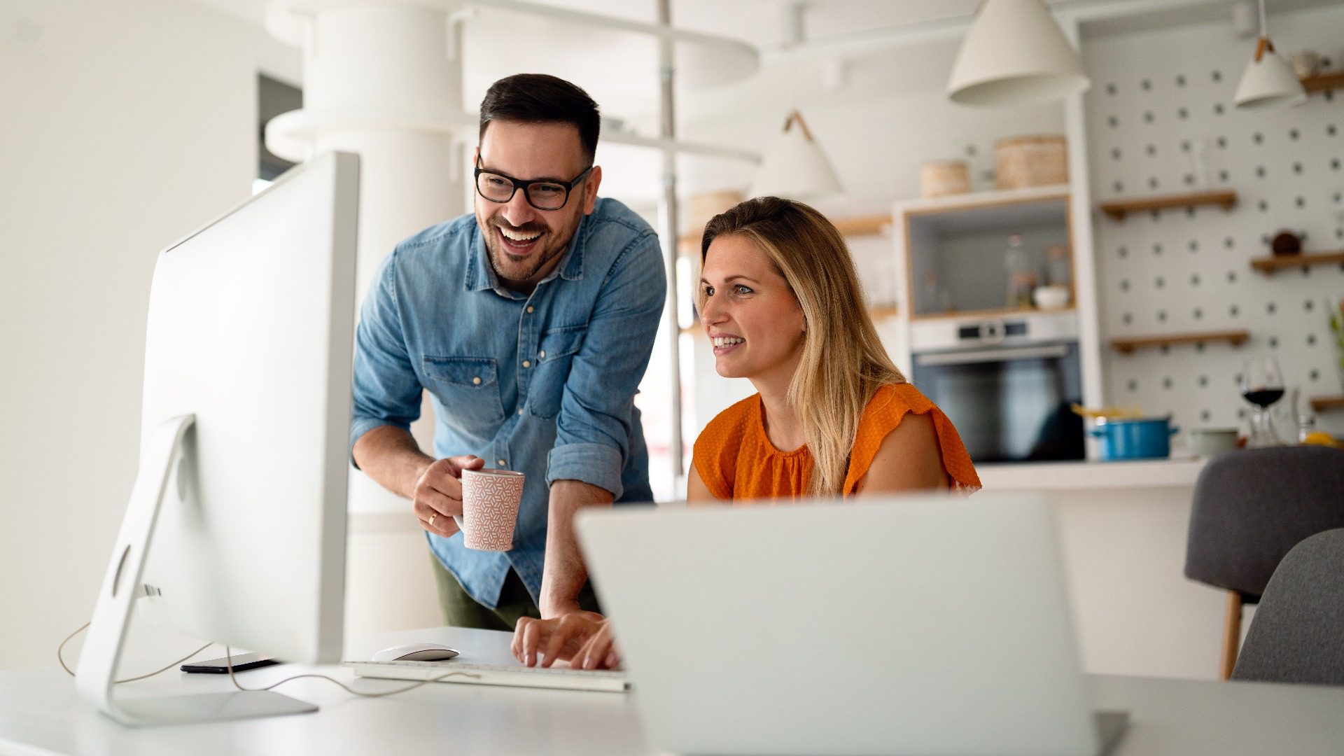 Portrait of success business people working together in home office. Couple teamwork startup concept